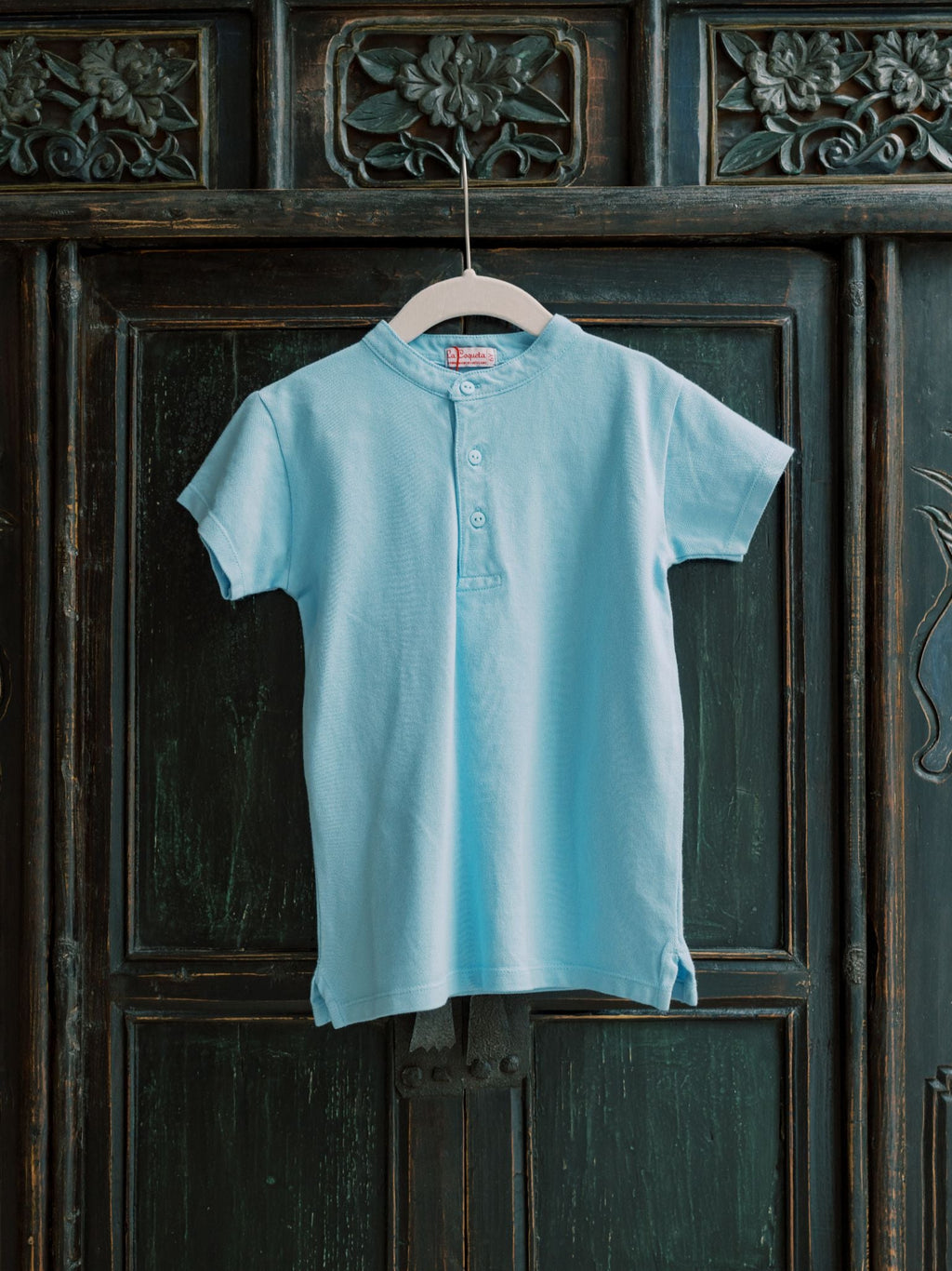 Polo de garçon bleu grisé