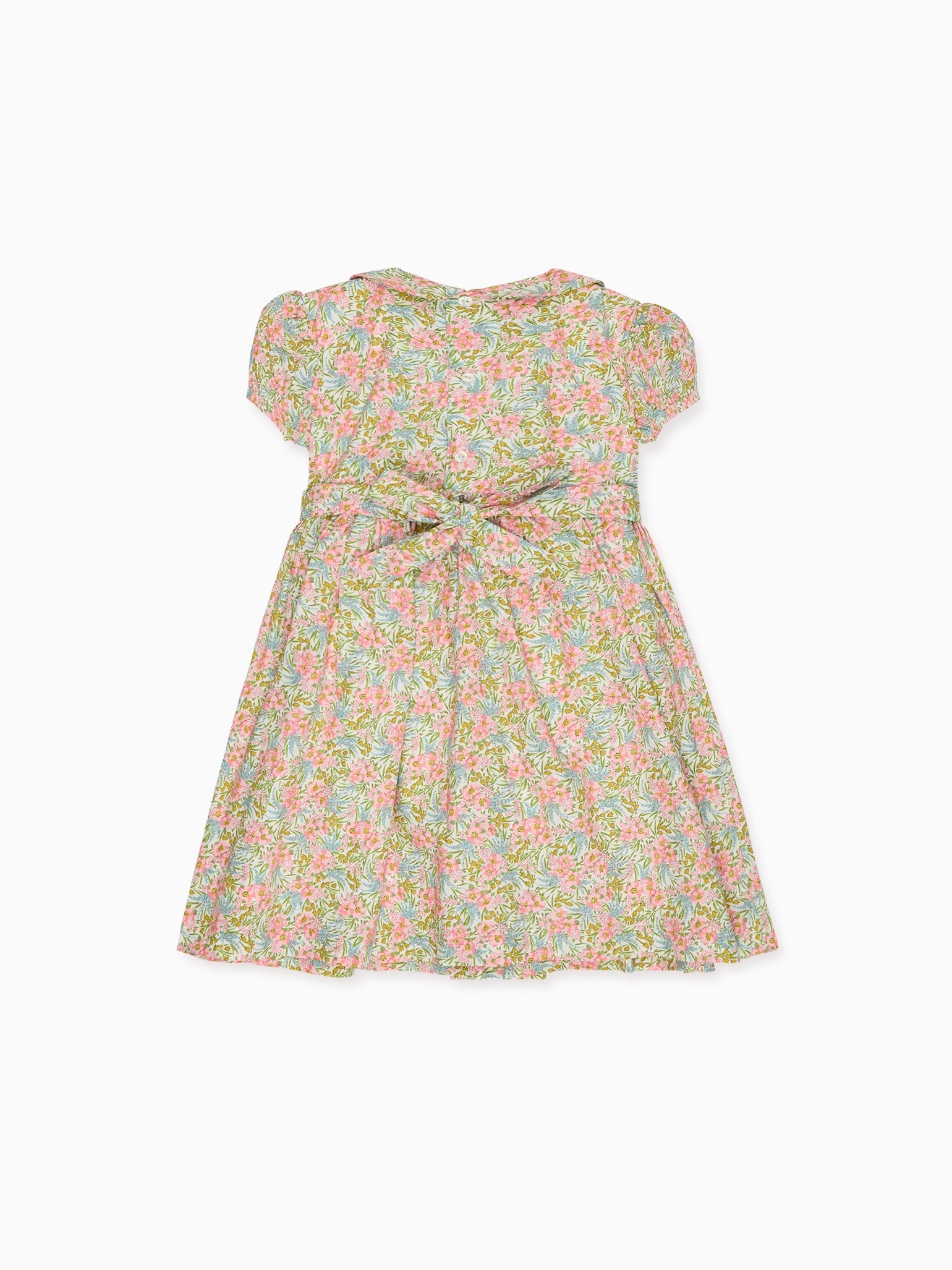 Robe fillette smockée main en tissu fleuri rose